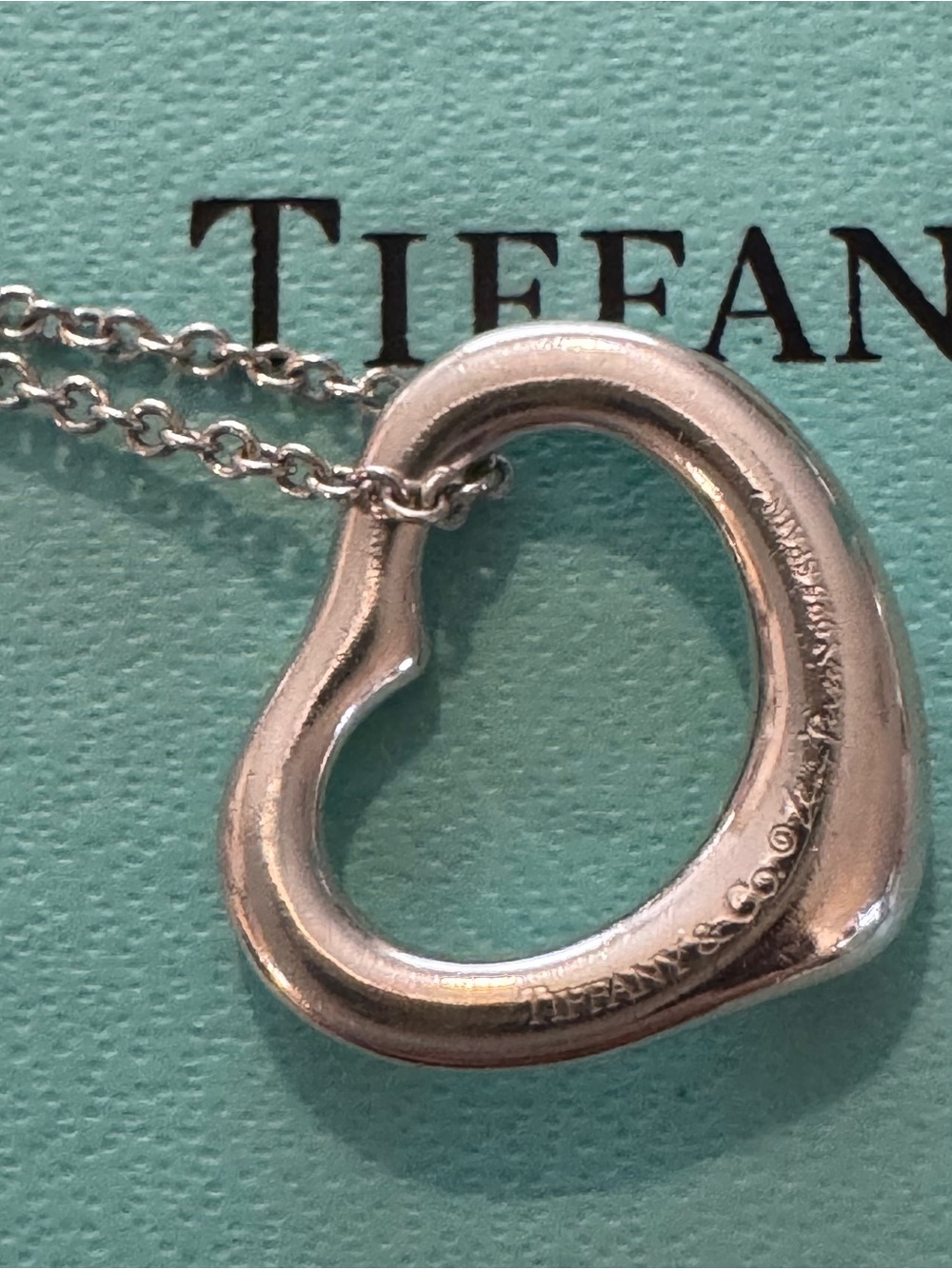 Tiffany & Co. Open Heart Pendant Necklace in steering silver . W /pouch , box .